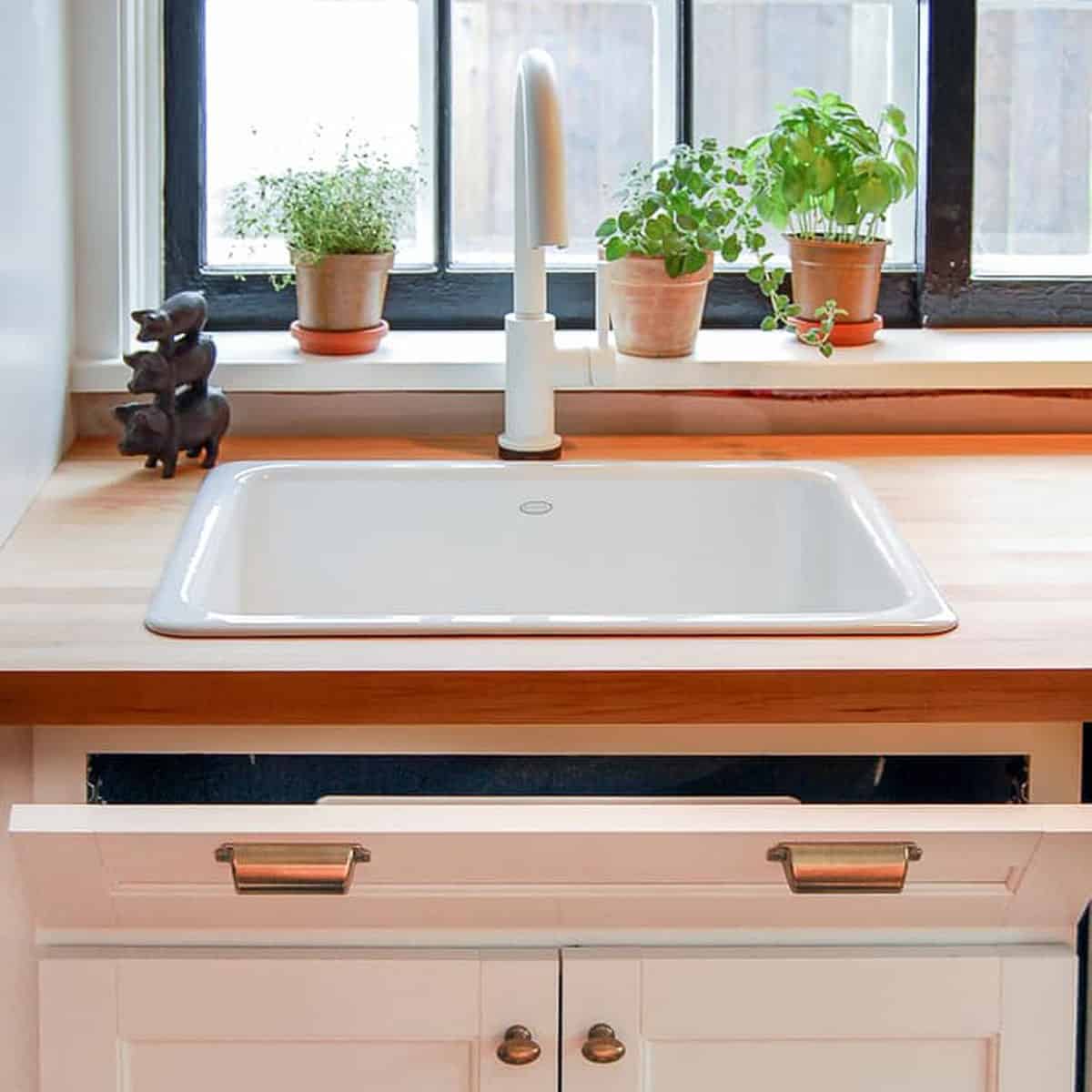 Keep Your Kitchen Tidy with Handy Tip-Out Trays for Sink Drawers