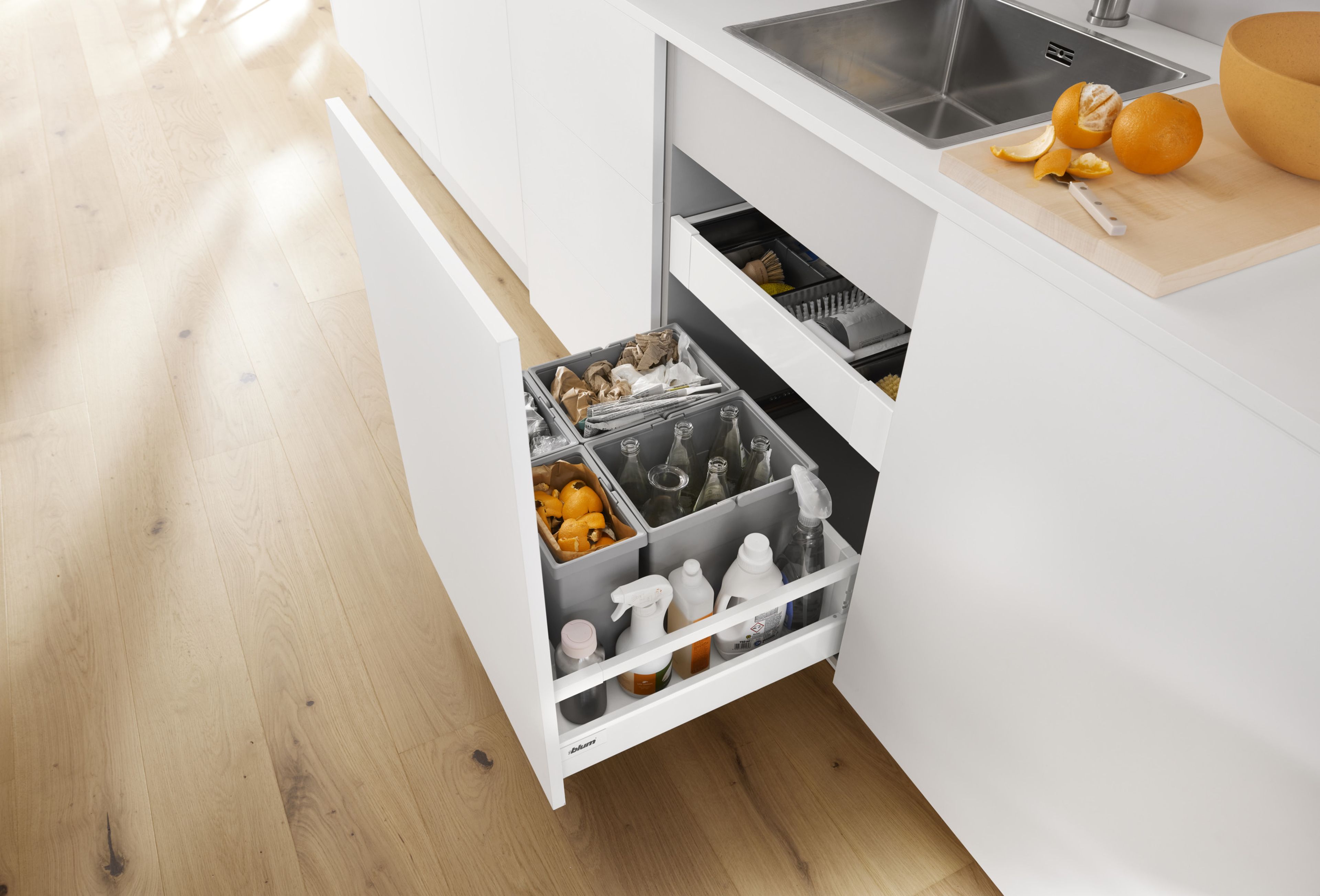 Efficient Storage Solutions: Kitchen Sink Tip-Out Drawers Explained