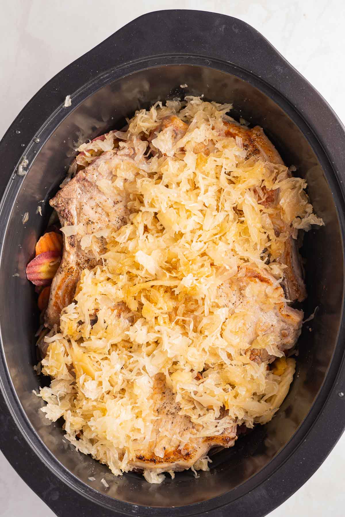 Make Delicious Pork Chop and Sauerkraut with These Crock Pot Recipes