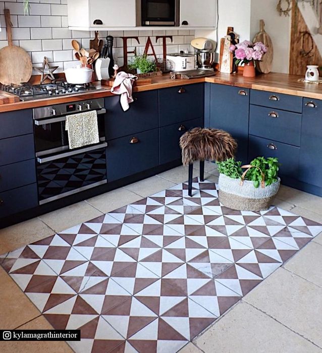 Need ideas for a rug by kitchen sink? Check out these stylish and practical options for your floor.